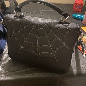 NWT spiderweb purse